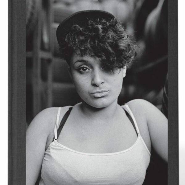(Book cover image) Bella Santiago Rodriguez, aspiring auto shop worker. @ Edwin Torres/Bronx Photo League